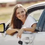 Woman happy about purchasing a vehicle at Transitowne near Buffalo