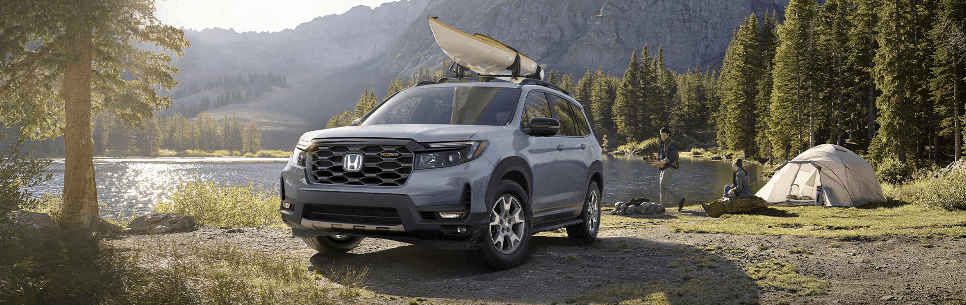2023 Honda Passport lake camping man woman