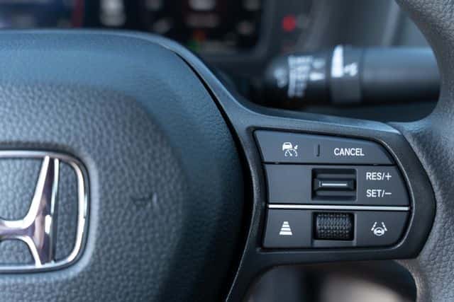 Close-up of 2025/2026 Honda Accord steering wheel with Honda Sensing safety controls at Zeigler Honda of Racine