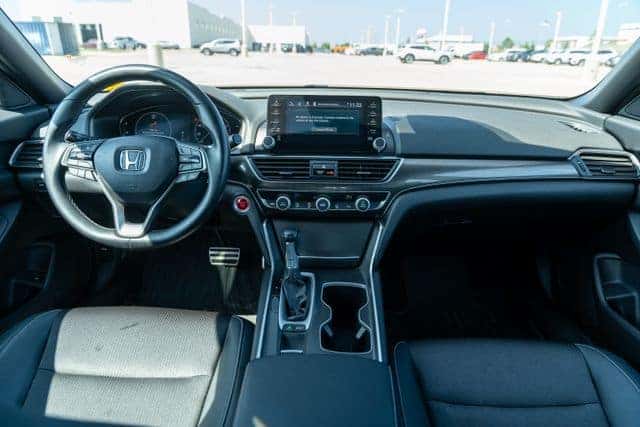 Interior cabin and dashboard of a certified Honda Accord with modern technology features