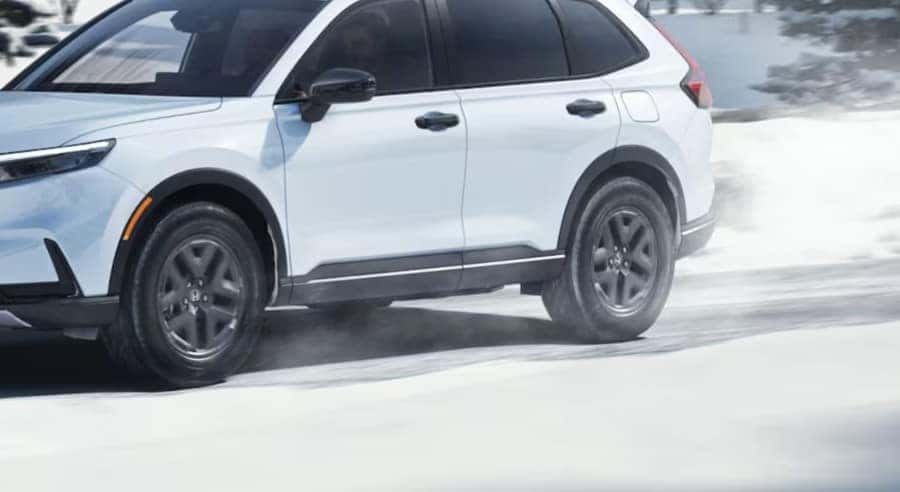 Road salt buildup on Honda vehicle during winter driving